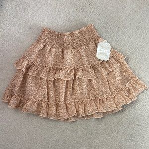 Altar’d State tiered ruffle cheetah print mini skirt in cream/tan